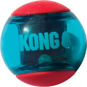 KONG Squeezz Action Ball Roja - Juguete Sonoro para Perros Medianos con Textura y Rebote